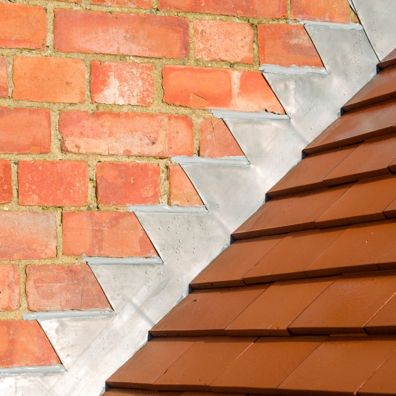 chimney flashing stair stepping up red masonry