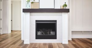 %Title% | Sureglow Stove &Amp; Chimney a white fireplace surround with a gas fireplace